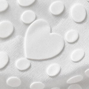 Secret Saviours patented Derma Dot™ technology close-up on white fabric